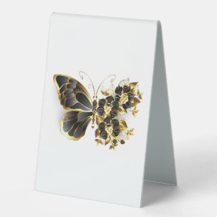 Goldener Schmetterling mit schwarzem Orchid Tischaufsteller