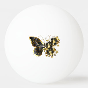 Goldener Schmetterling mit schwarzem Orchid Tischtennisball