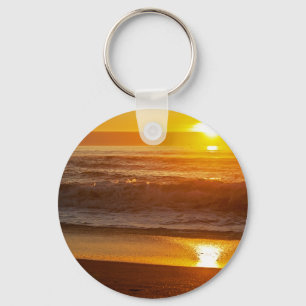 Goldener Sonnenuntergang an Horsfall Strand Schlüsselanhänger