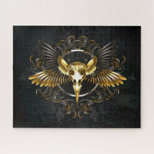 Goldener Vogelschädel auf schwarzem Hintergrund