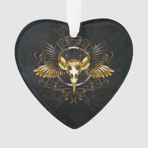 Goldener Vogelschädel auf schwarzem Hintergrund Ornament
