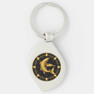 Goldenes Fische-Sternzeichen-Symbol umgeben von St Schlüsselanhänger