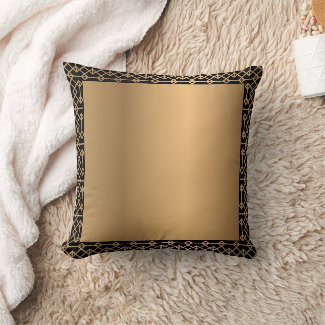 Goldenes Kissen mit schwarzem Trimm (Decke)