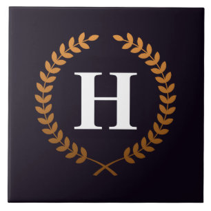 Goldenes Lorbeerkranz-Monogramm Fliese