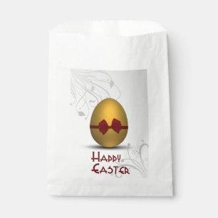 Goldenes Ostereier mit braunem, floralfarbenem Mus Geschenktütchen