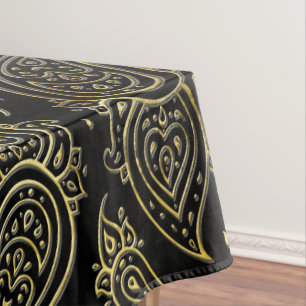 Goldenes prägeartiges Paisley-Muster auf Schwarze Tischdecke