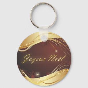 Goldenes Weihnachtsmotiv mit rotem Hintergrund... Schlüsselanhänger