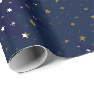 Goldfunkelnd Sterne und weiße Sterne auf blauem Geschenkpapier