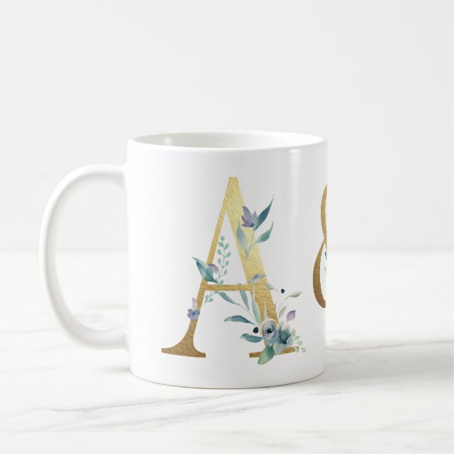 Goldinitialen, mit blauen Blattpaaren Tasse (Links)