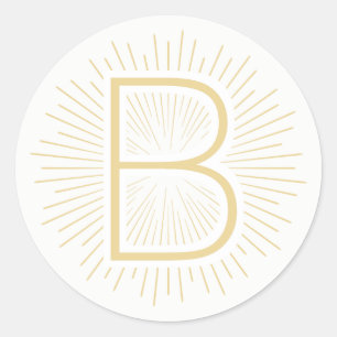 Goldmonogramm-Buchstabe-glänzende Goldstrahlen Runder Aufkleber