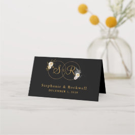 Goldmonogramm für die erste Hochzeit mit schwarzem Platzkarte