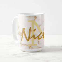 Goldmonogramm und erste kaffeetasse