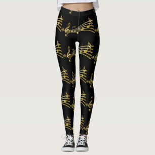 GoldMusiknoten auf schwarzen Leggings