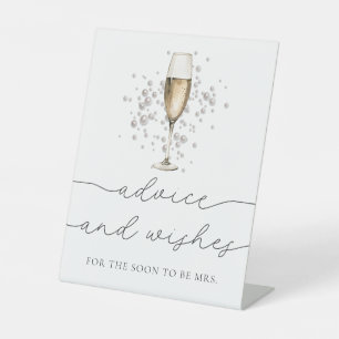 Goldperlen und Prosecco-Rat und Wünsche Unterschri Sockelschild