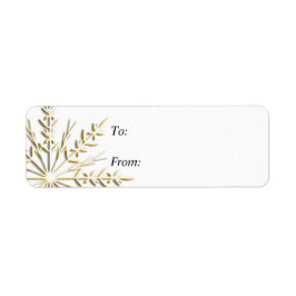 Goldschneeflocke auf dem weißen Weihnachtsgeschenk