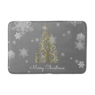 Goldweihnachtsbaum und Schneeflocken Badematte