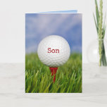 Golf Ball On T-Shirt für Sons Geburtstagskarte Karte<br><div class="desc">Für Son's Geburtstag nahen Golfball auf rotem Tee in grünem Gras. Text auf Ball kann bearbeitet werden.</div>