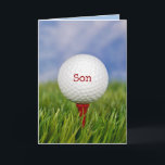 Golf Ball On T-Shirt für Sons Geburtstagskarte Karte<br><div class="desc">Für Son's Geburtstag nahen Golfball auf rotem Tee in grünem Gras. Text auf Ball kann bearbeitet werden.</div>