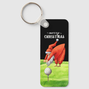 Golf Santa Claus mit Golfbälle auf Grün Schlüsselanhänger