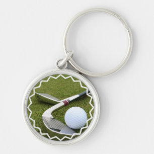 Golf spielender Schlüsselanhänger