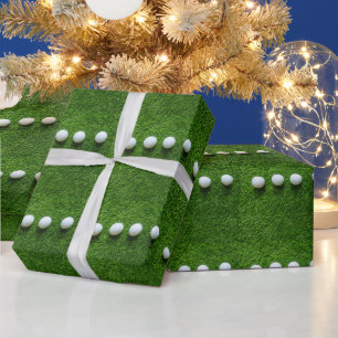 Golfball auf grünem Gras Geschenkpapier