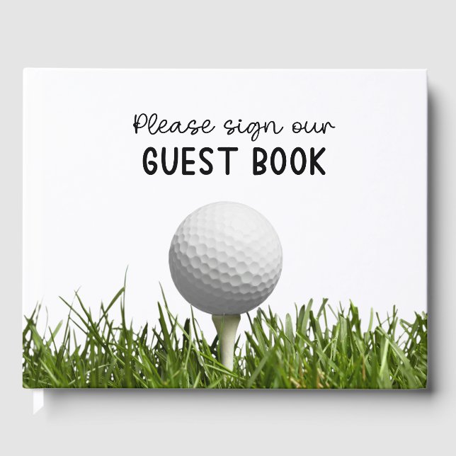 Golfball auf grünem Grasgolfer Gästebuch (Vorderseite)