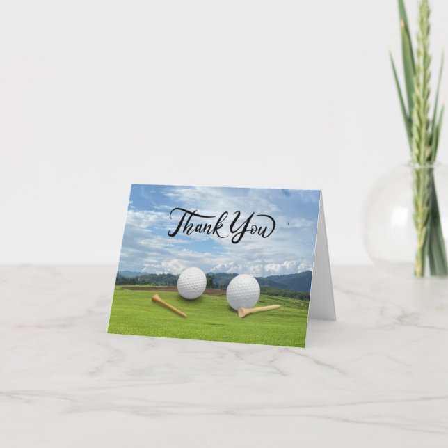 Golfball mit Abschlag auf grünem Gras Dankeskarte (Vorderseite)