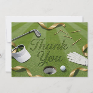 Golfball mit Text Danke auf grünem Gras