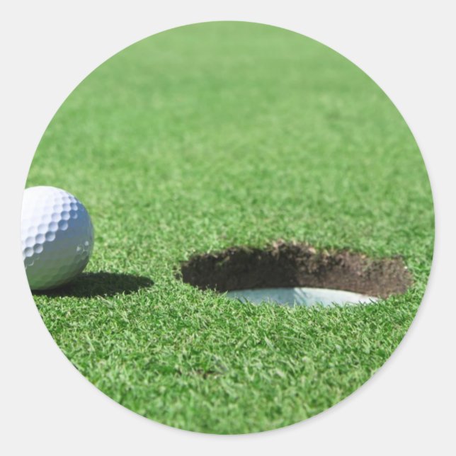 Golfball und Loch Runder Aufkleber (Vorderseite)