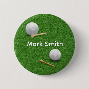 Golfball und Tee auf grünem Gras Knopf Button