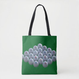Golfbälle auf einem grünen Hintergrund befinden si Tasche