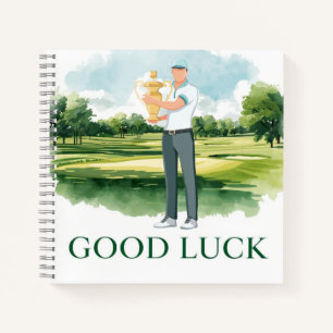 Golfspieler auf Fairway mit Text Viel Glück Notizbuch