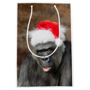 Gorilla Biddy in einem Weihnachtshut Mittlere Geschenktüte