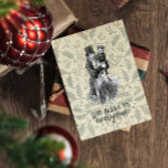 Gott segne uns alle Dickens Weihnachtskarte<br><div class="desc">Eine Vintage viktorianische Abbildung von Bob Cratchit und Tiny Tim von Charles Dickens A Christmas Carol. "Frohe Weihnachten für uns alle; Gott segne uns,  alle!" ist Tiny Tims bekanntestes Zitat. Hier auf einem Vintagen grünen Hintergrund von heilig. Sie können alle Texte nach Ihren Wünschen anpassen.</div>