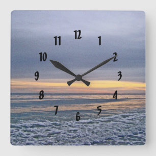 Göttlicher Sonnenuntergang am Oak Island Beach Quadratische Wanduhr