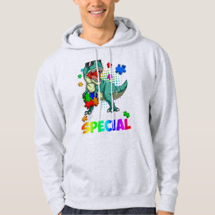Grab this cute Born To Be Special T rex Puzzle Din Hoodie