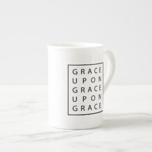 Grâce sur la tasse moderne d'écriture sainte de