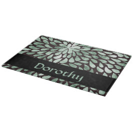 Gradient grüne Blätter auf schwarz Schneidebrett