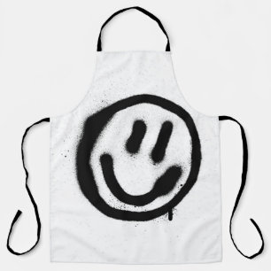 Graffiti lächelnd Gesicht Emoticon in schwarz auf  Schürze