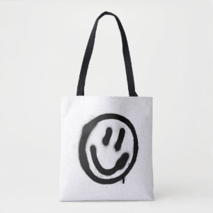Graffiti lächelnd Gesicht Emoticon in schwarz auf  Tasche