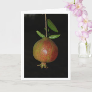 Granatapfel hängt nachts am Baum Karte