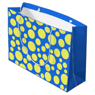Grand Sac Cadeau Pois jaunes sur un arrière - plan bleu ciel