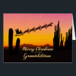 Grandchildren Christmas Santa Over Desert<br><div class="desc">A Christmas card for your grandchildren showing Santa flying over the desert. Lots of tall cactus are seen in silhouette. Wish a merry Christmas from the desert with a lovely sunset colored card.</div>