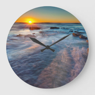 Grande Horloge Ronde Les rayons du soleil illuminent l'océan Pacifique
