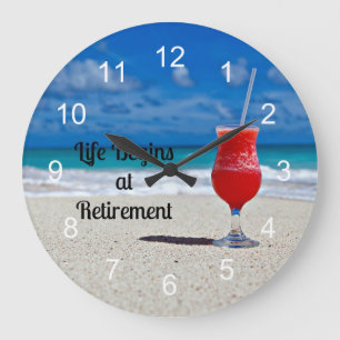 Grande Horloge Ronde Life Begins at Retirement, frosty drink on beach