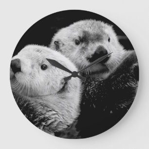 Grande Horloge Ronde Loutres de mer : Paire blanche noire.