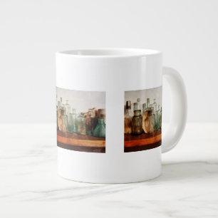 Grande Tasse Rangée de flacons de médicaments