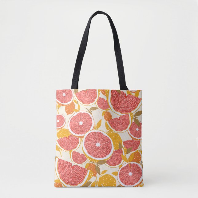 Grapefruit und halbierte Scheiben mit Blätter auf  Tasche (Vorderseite)