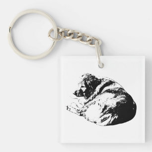 Graphic Curl Dog sorgt für Ruhe auf Winterreisen Schlüsselanhänger