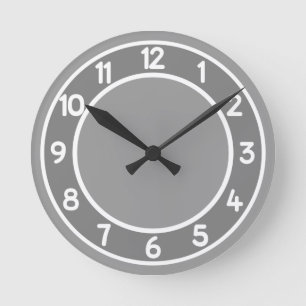 Grau und Weiß auf einer beliebigen Uhr der Hinterg